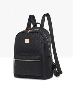 Detail view of large black commuter backpack featuring geometric circular textured fabric