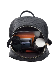 Interior detail of large woven PU backpack showing multiple compartments and storage space