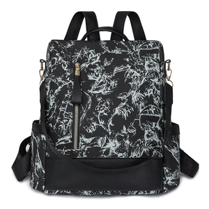 Sac à dos femme noir avec imprimé floral blanc et design antivol haute résistance