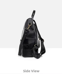 Side view of black lychee leather backpack showing square patchwork and gold hardware