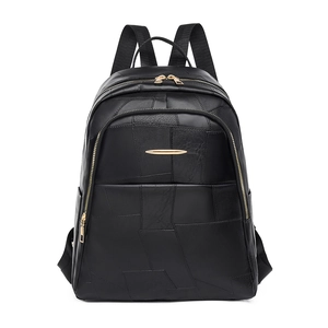 Black PU leather backpack for travel and laptop featuring geometric patchwork and gold hardware