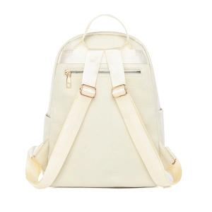 Detail of backpack back with geometric stitching, adjustable straps and gold metal zipper