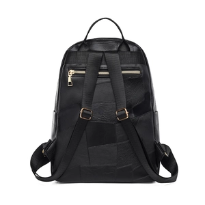 Detailed back view of a black patchwork PU leather backpack with gold hardware accents