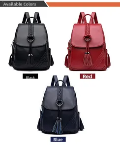 Three large capacity faux leather backpacks in black, red, and blue with tassel details