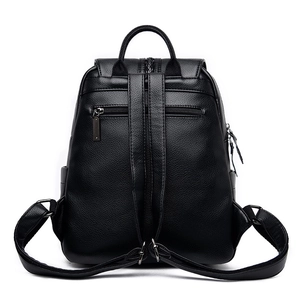 Rear view of black lychee grain leather backpack showing straps and anti-theft zipper pocket