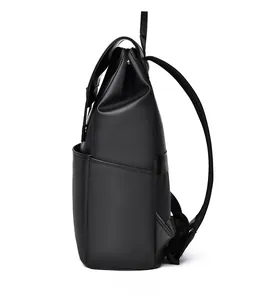 Side view of sleek black business laptop backpack showing the slim profile and texture