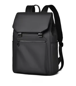 Side view of black waterproof backpack featuring large flap and matte leather texture