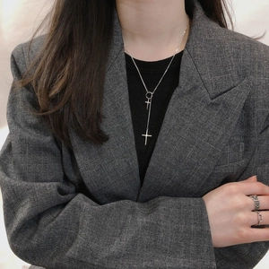 Elegant Y-shaped S925 silver necklace with minimalist double cross pendants on a model