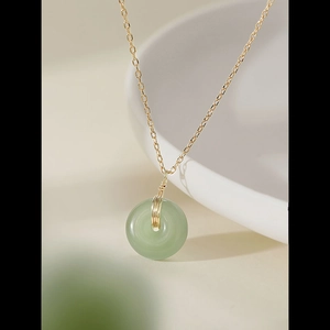 Elegant Hetian jade Ping'an Kou pendant necklace with minimalist gold chain design