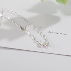 Minimalist S925 sterling silver butterfly pendant necklace on a clean white background