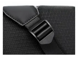 Detail of durable black adjustment buckle and woven nylon strap on mesh fabric backpack