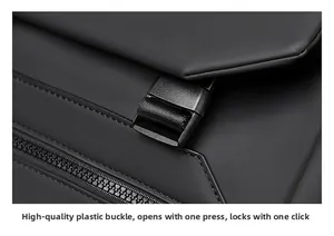 Detail of durable buckle and waterproof fabric on men's large capacity travel backpack