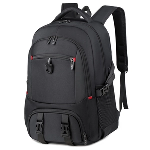 Three-quarter view of a black large-capacity travel backpack with red zipper accents