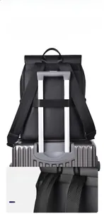 Detail showing back trolley sleeve and padded S-shape shoulder straps of black backpack