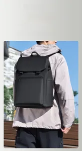 Outdoor shot of black waterproof business backpack with large capacity and sleek design