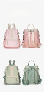 Detailed views of pink and green wave-textured backpacks with functional zipper pockets