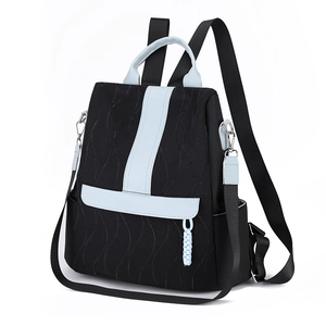 Quilted black nylon backpack with blue trim and adjustable straps for women