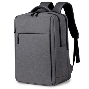 Detail of gray business laptop backpack with reinforced handle and hidden front zipper pocket