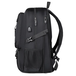 Detail of travel backpack showing USB charging port and breathable mesh side pocket