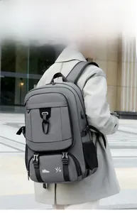 Macro shot of durable grey synthetic fabric and functional zipper compartments on travel backpack