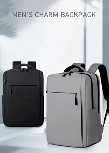 Close-up of black and grey business backpacks with texture detail and zippers