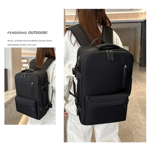 Detail view of large travel backpack with ergonomic straps and multi-pocket design