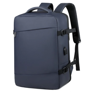 Detail of navy business laptop backpack with side USB port and textured oxford fabric