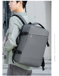 Business laptop backpack side view featuring waterproof fabric and adjustable buckle straps