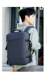 Deep blue business backpack with side USB charging port and adjustable buckle detail