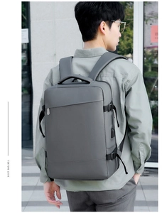 Close-up of business laptop backpack showing the side profile and integrated USB charging port