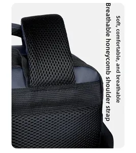 Close-up of padded honeycomb mesh shoulder straps and breathable back panel of the backpack