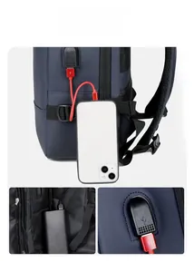 Detail of exterior USB charging port on navy blue water-resistant business backpack