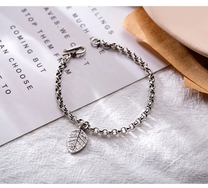 Detailed view of retro S925 sterling silver leaf pendant with intricate vein textures