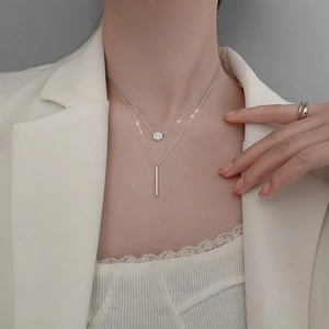 Minimalist double-layer silver necklace with round zircon and vertical bar pendants