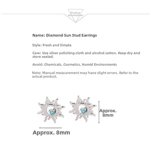 Detail showing 8mm S925 silver sunflower stud earrings with blue zircon in macro view
