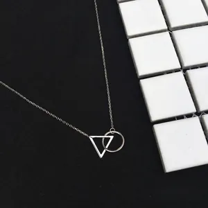 Minimalist S925 silver geometric necklace with interlocking ring and triangle charms