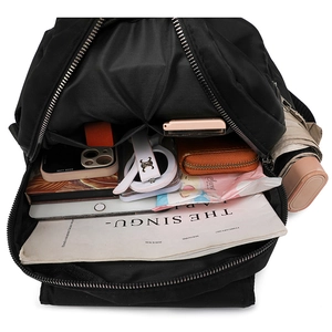 Interior view showing large capacity compartments and organized storage of the backpack