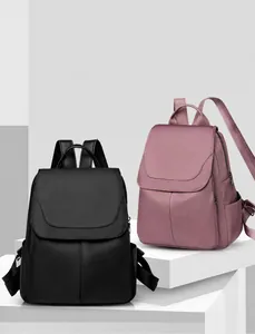 Front view of black and pink oxford fabric anti-theft backpacks with minimalist design