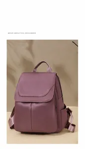 Detail of mauve Oxford fabric backpack showing anti-theft flap and sleek side pocket