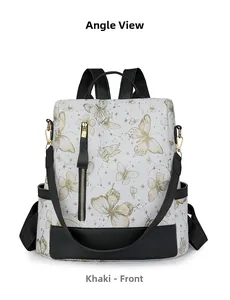 Front view of khaki nylon backpack featuring gold butterfly patterns and black leather details