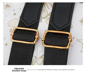 Detail of adjustable black nylon backpack straps with gold metal buckles on a white bag