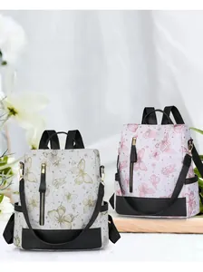 Detail view of cream and pink butterfly print nylon backpacks with adjustable straps