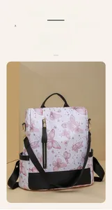 Detail showing butterfly floral print and anti-theft zipper on the casual backpack