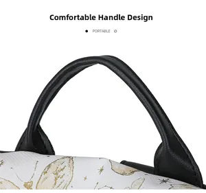 Detail of comfortable black leather handle on white nylon backpack with gold butterfly print