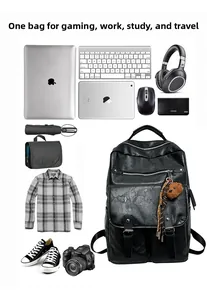 Flat lay of black leather backpack with various tech gadgets and cute bear charm detail
