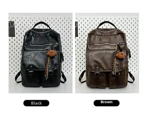 Detail of black and brown PU leather backpacks with silver zippers and plush bear charms