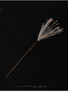 Macro detail of Christmas glitter firework stem with sparkling sequins for festive decor