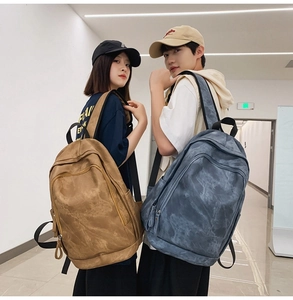 Detail of vintage textured large capacity backpacks for travel and school use