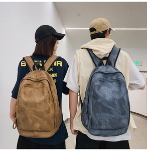 Rear view of khaki and grey casual backpacks with marble texture on models