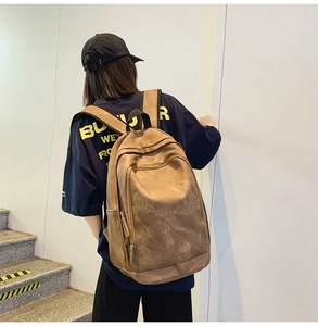 Side view of a vintage large-capacity backpack showing detailed texture and strap fit